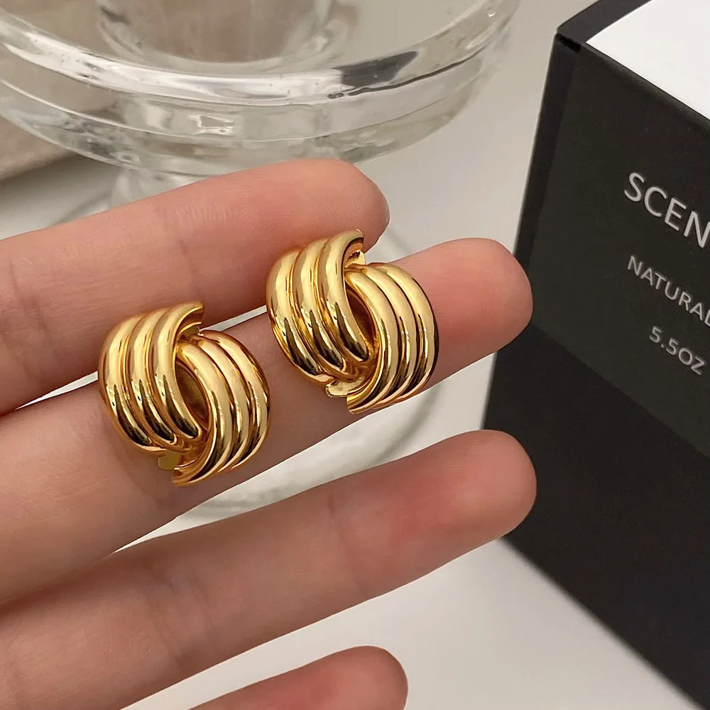 Zlaté náušnice „Twist“