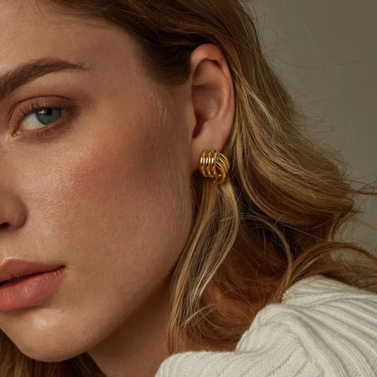 Zlaté náušnice „Twist“