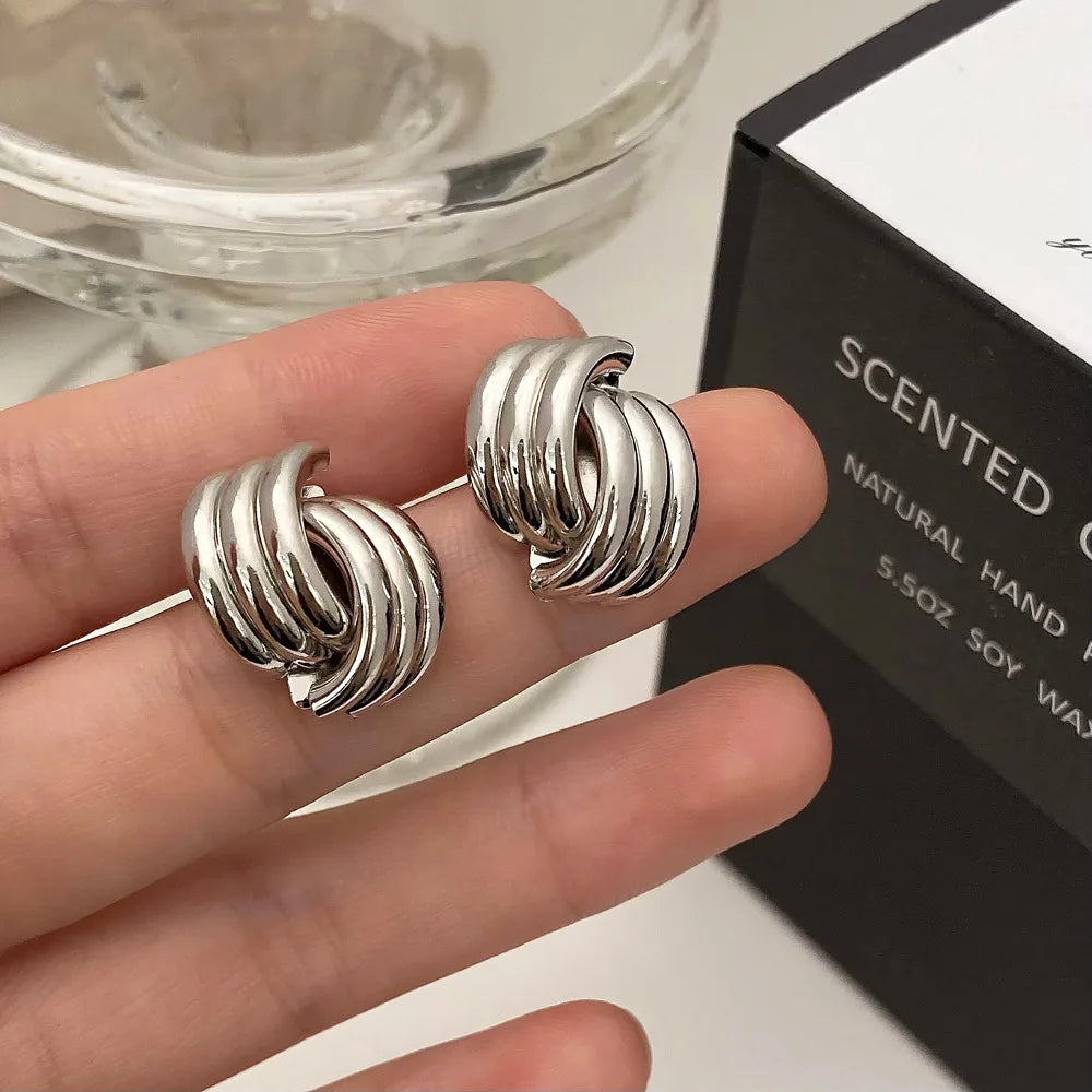 Zlaté náušnice „Twist“